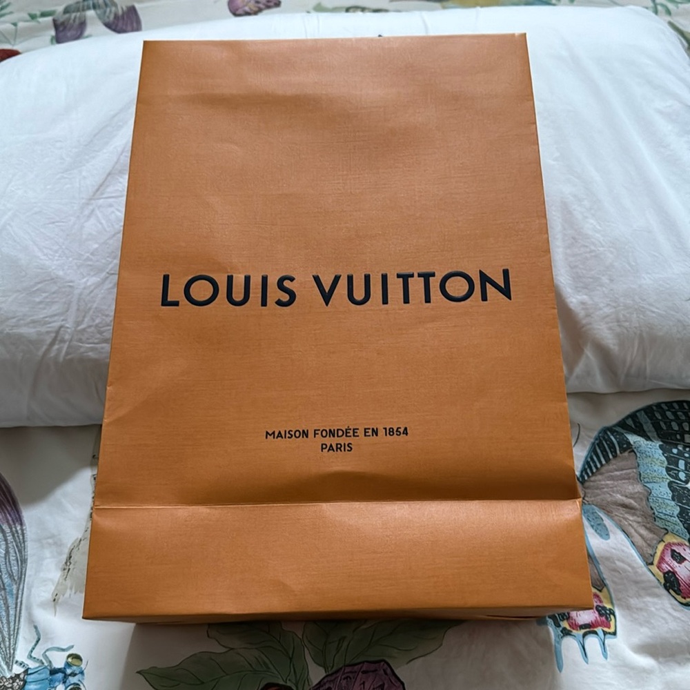 Louis Vuitton shopping bad. 10x14x3. Orange and blue. Good condition.